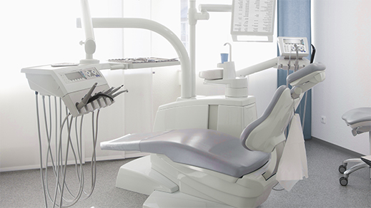 Image of dental office with chair and equipment